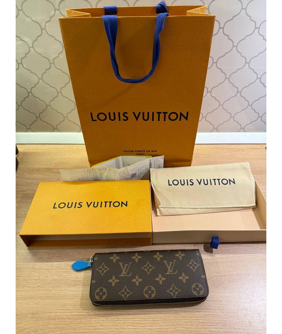 LOUIS VUITTON Коричневый кожаный кошелек, фото 7