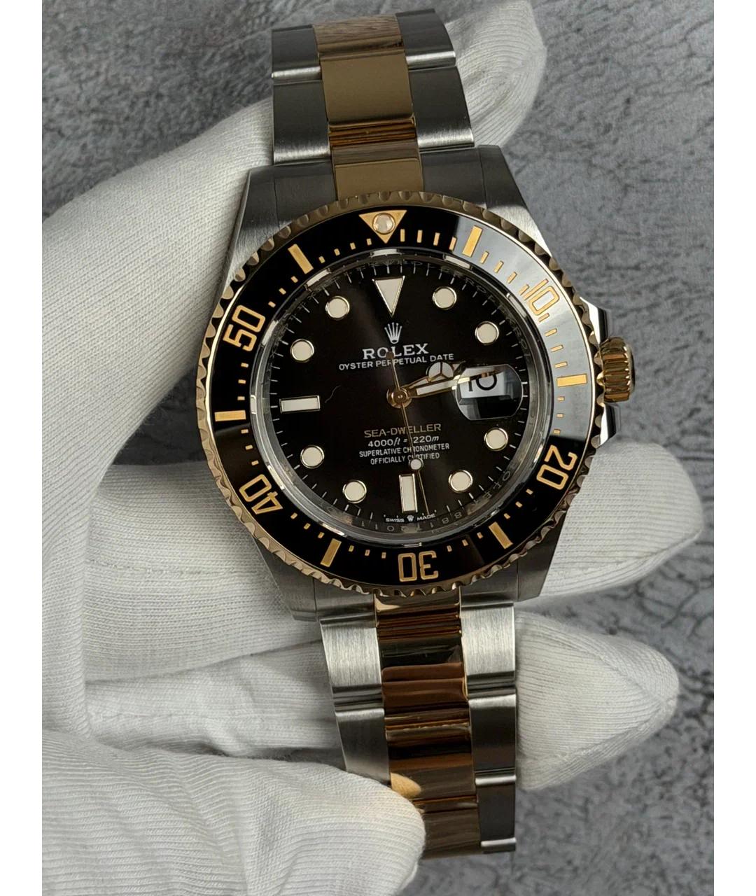 ROLEX Черные часы из желтого золота, фото 2