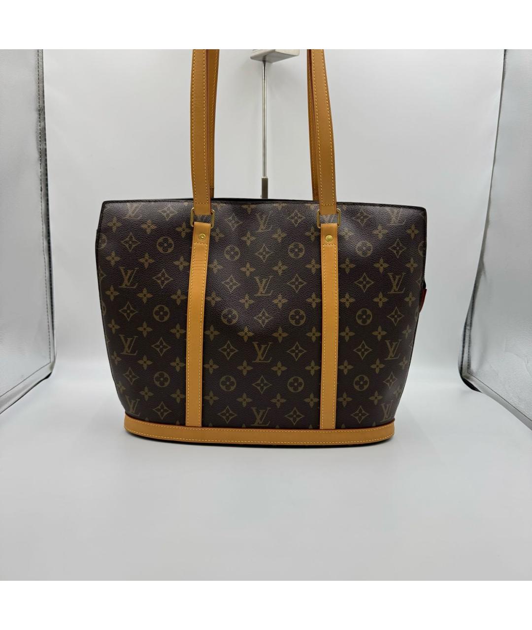 LOUIS VUITTON Коричневая кожаная сумка тоут, фото 9
