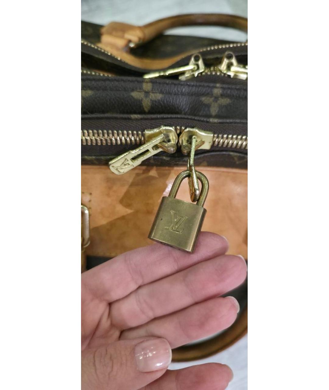 LOUIS VUITTON Коричневая кожаная дорожная/спортивная сумка, фото 9