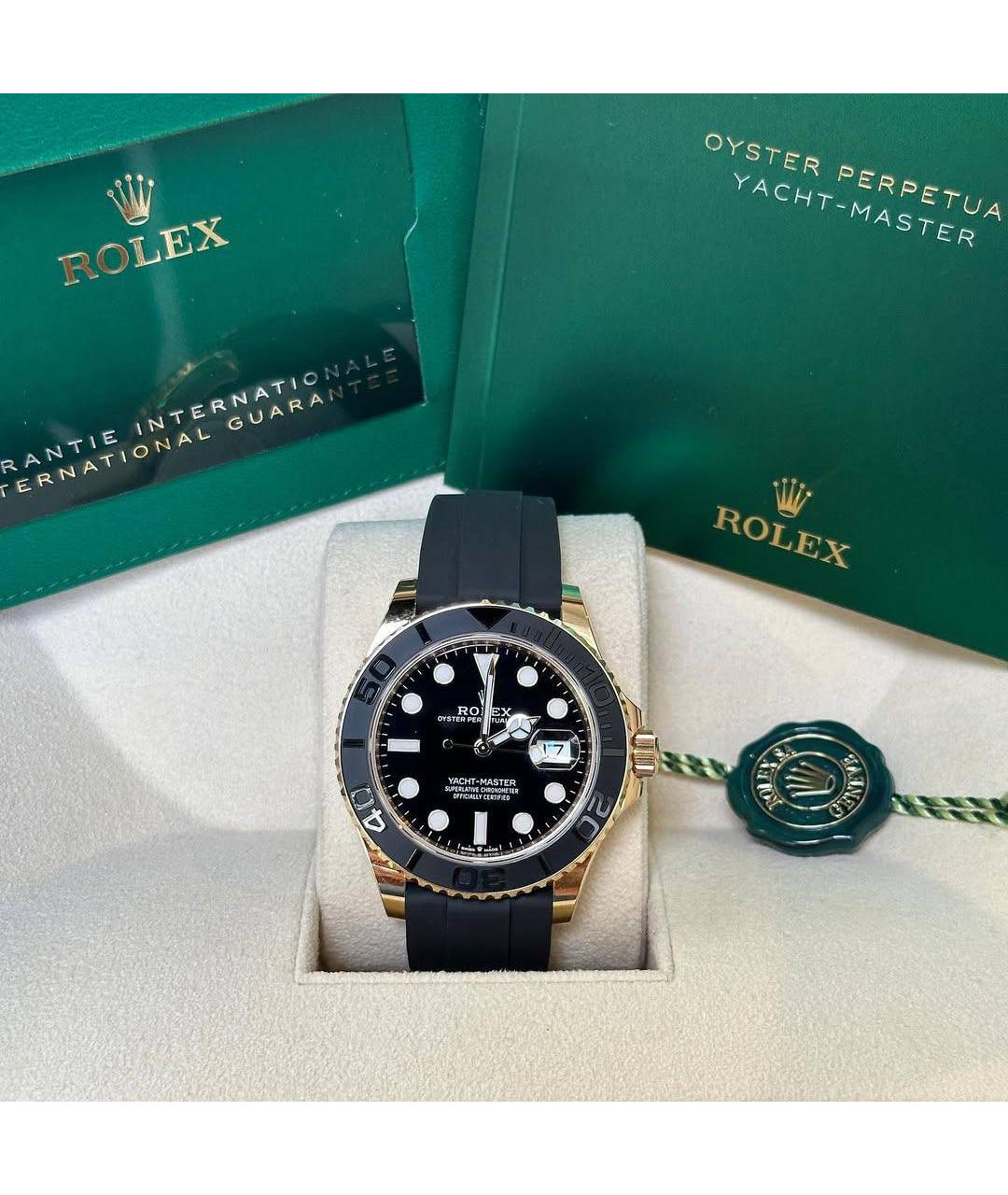 ROLEX Черные часы из желтого золота, фото 2