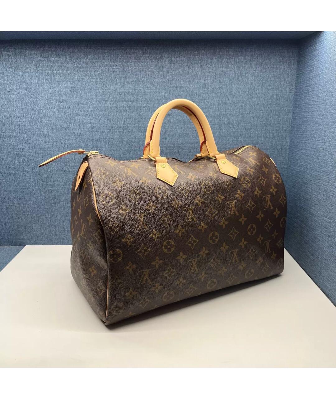 LOUIS VUITTON Коричневая кожаная сумка с короткими ручками, фото 2