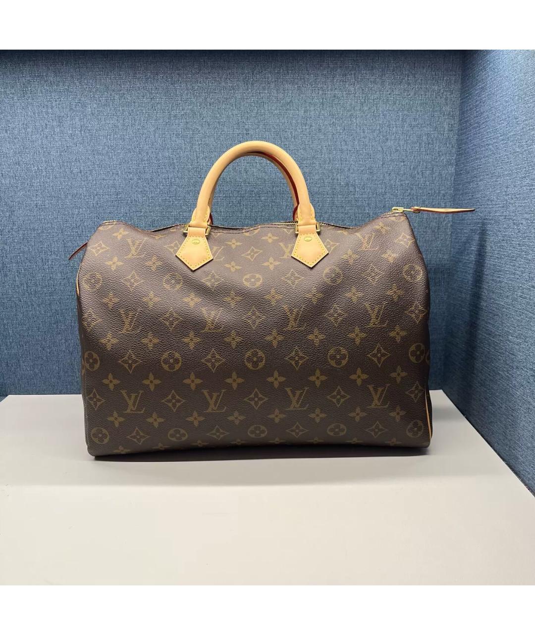 LOUIS VUITTON Коричневая кожаная сумка с короткими ручками, фото 4