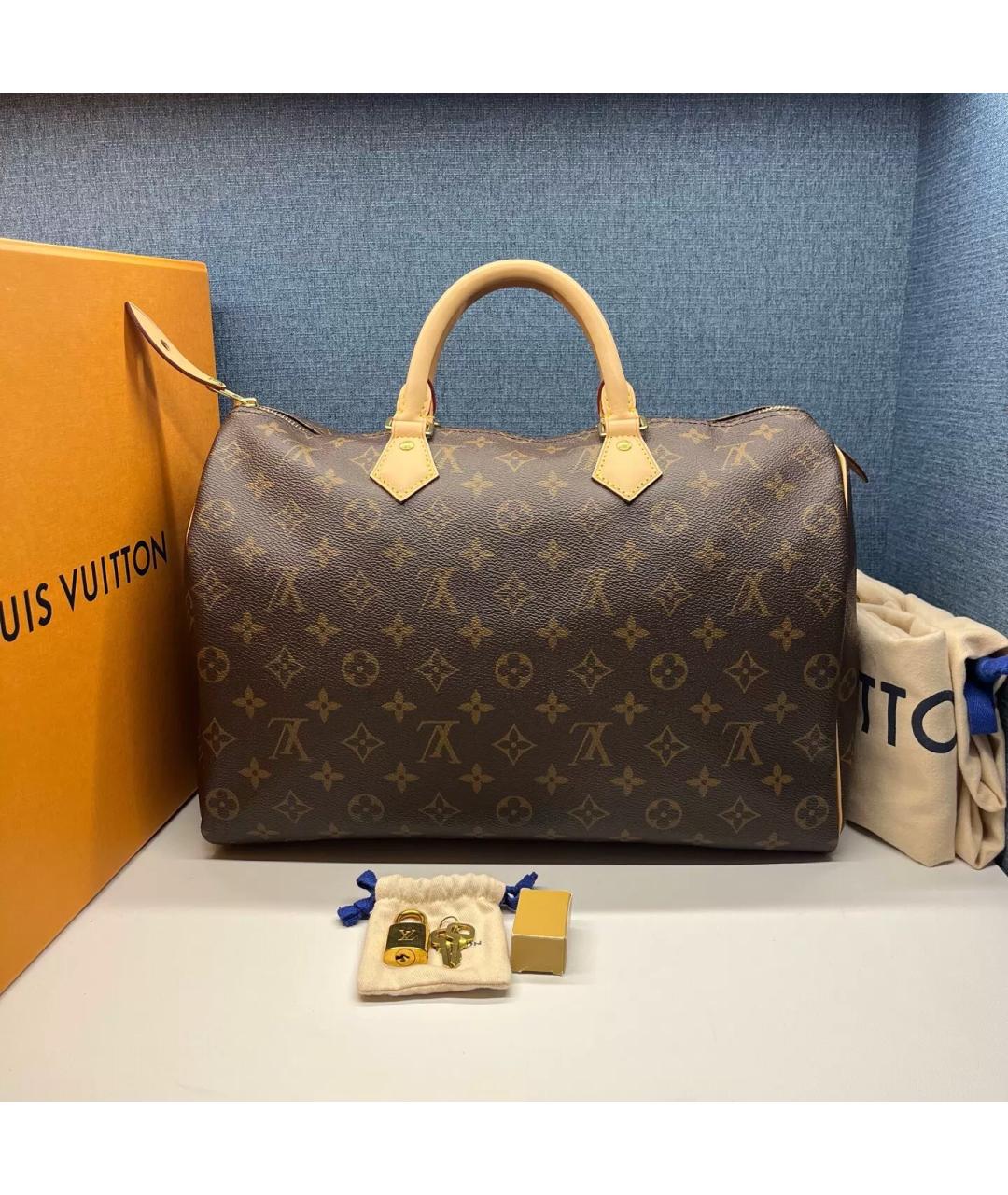 LOUIS VUITTON Коричневая кожаная сумка с короткими ручками, фото 8