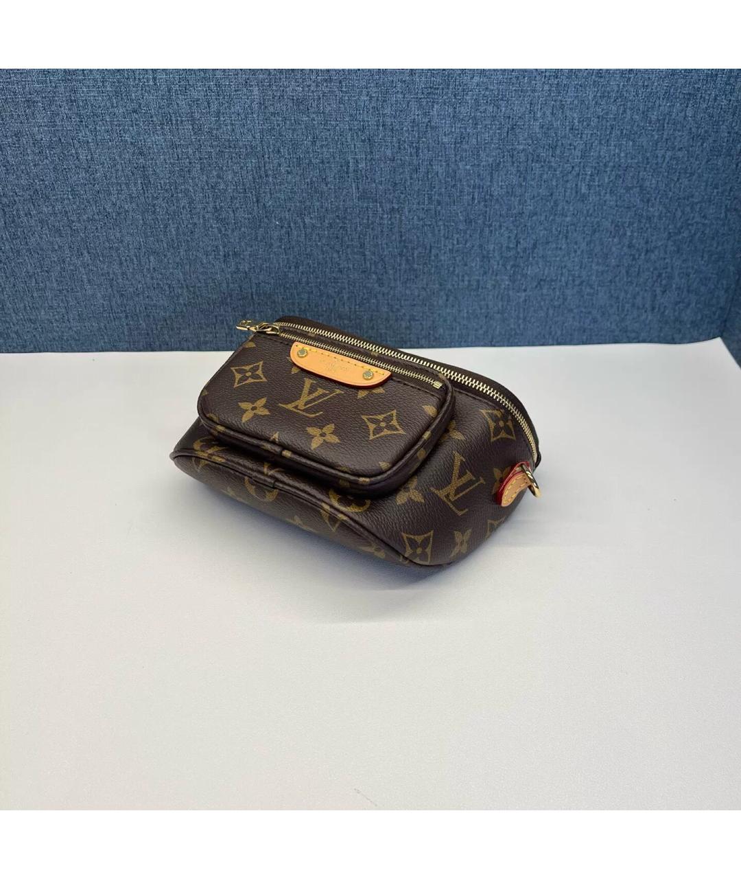 LOUIS VUITTON Коричневая кожаная поясная сумка, фото 6