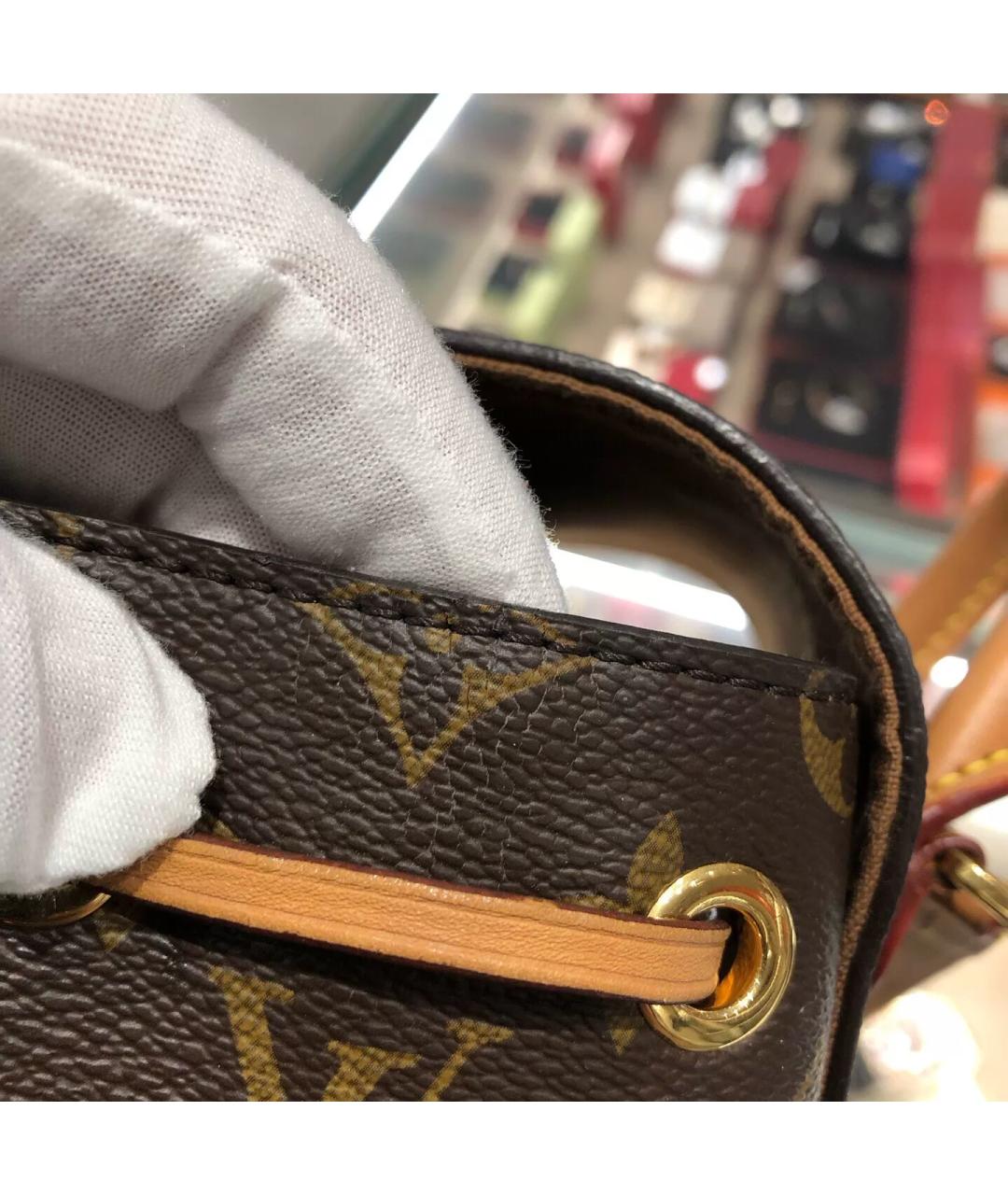 LOUIS VUITTON Коричневый кожаный рюкзак, фото 7