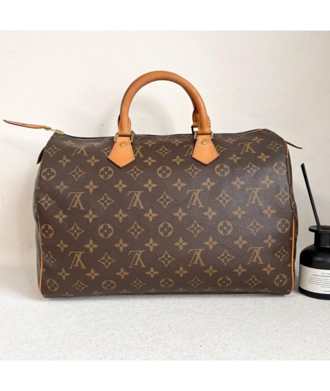LOUIS VUITTON Коричневая кожаная сумка с короткими ручками, фото 3