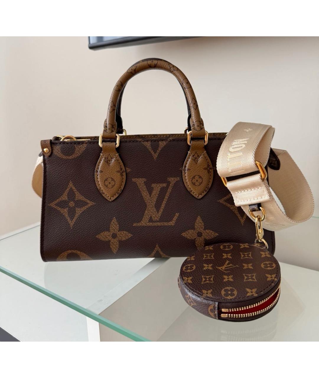 LOUIS VUITTON Коричневая кожаная сумка с короткими ручками, фото 6
