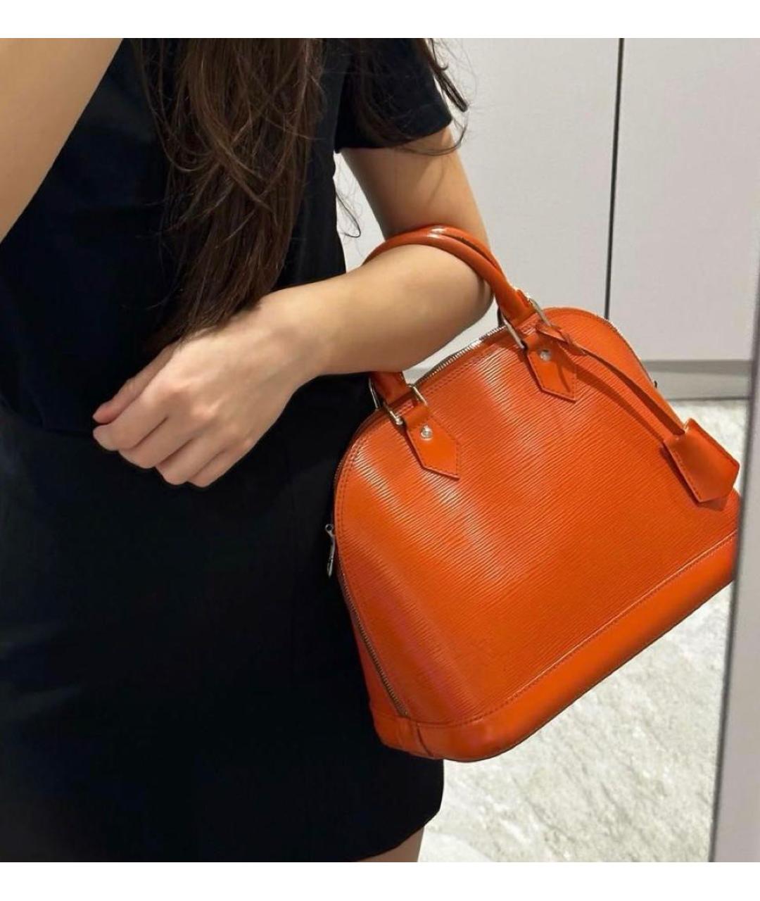 LOUIS VUITTON Оранжевая кожаная сумка с короткими ручками, фото 5