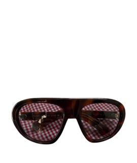 PRADA Очки и оправы