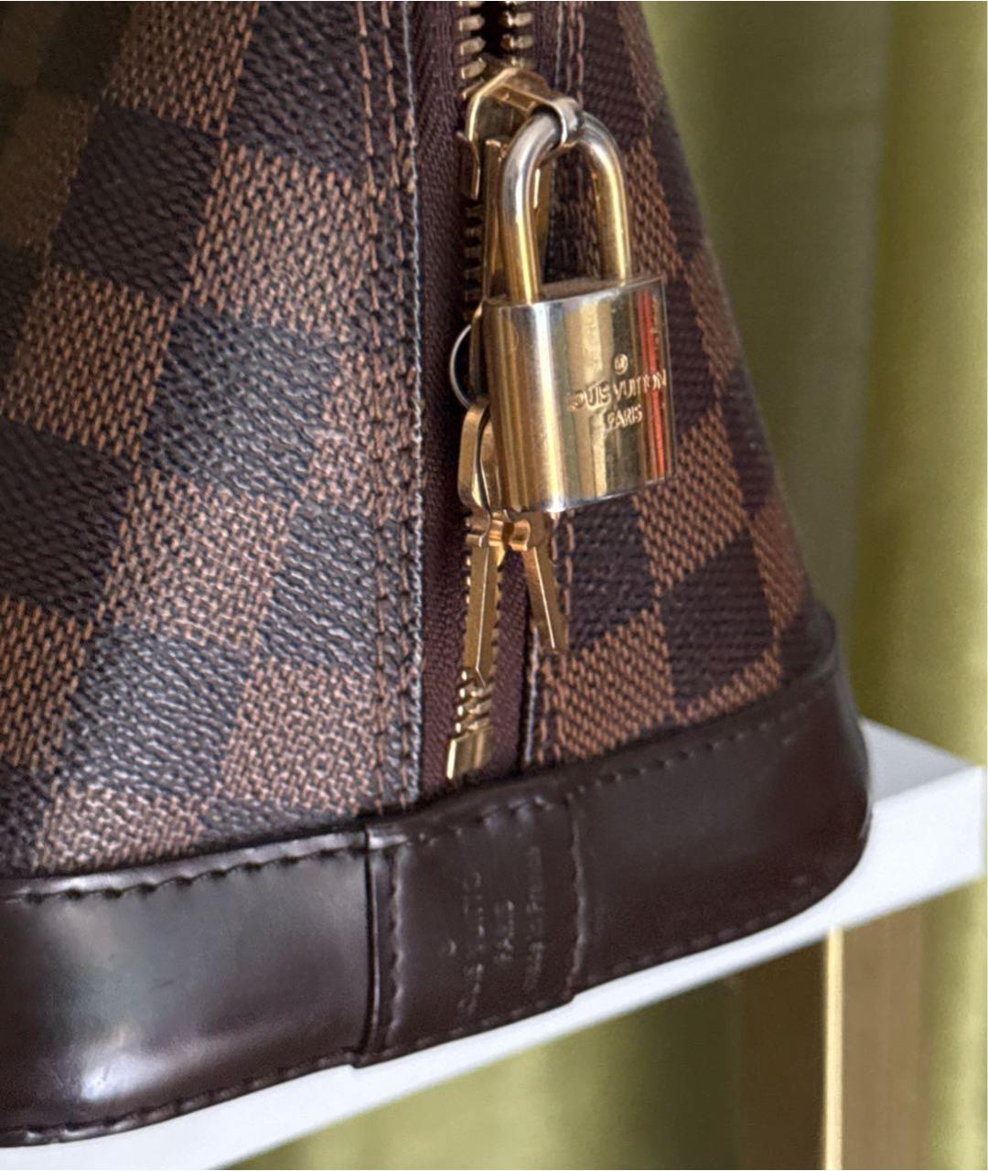 LOUIS VUITTON Коричневая кожаная сумка с короткими ручками, фото 6