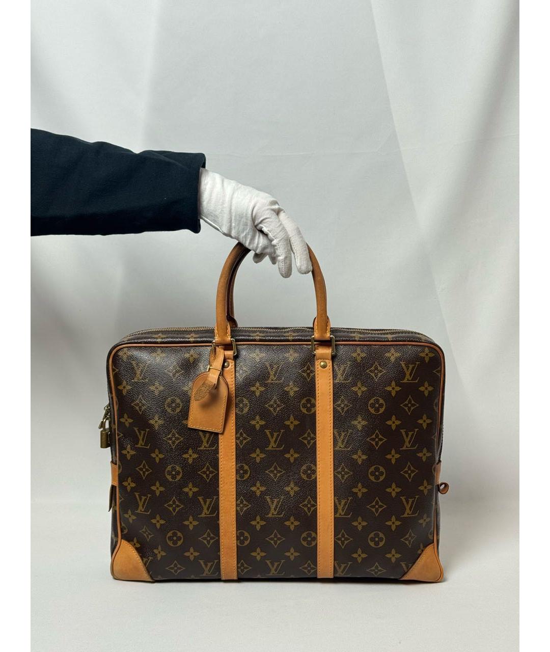 LOUIS VUITTON Коричневый кожаный портфель, фото 1
