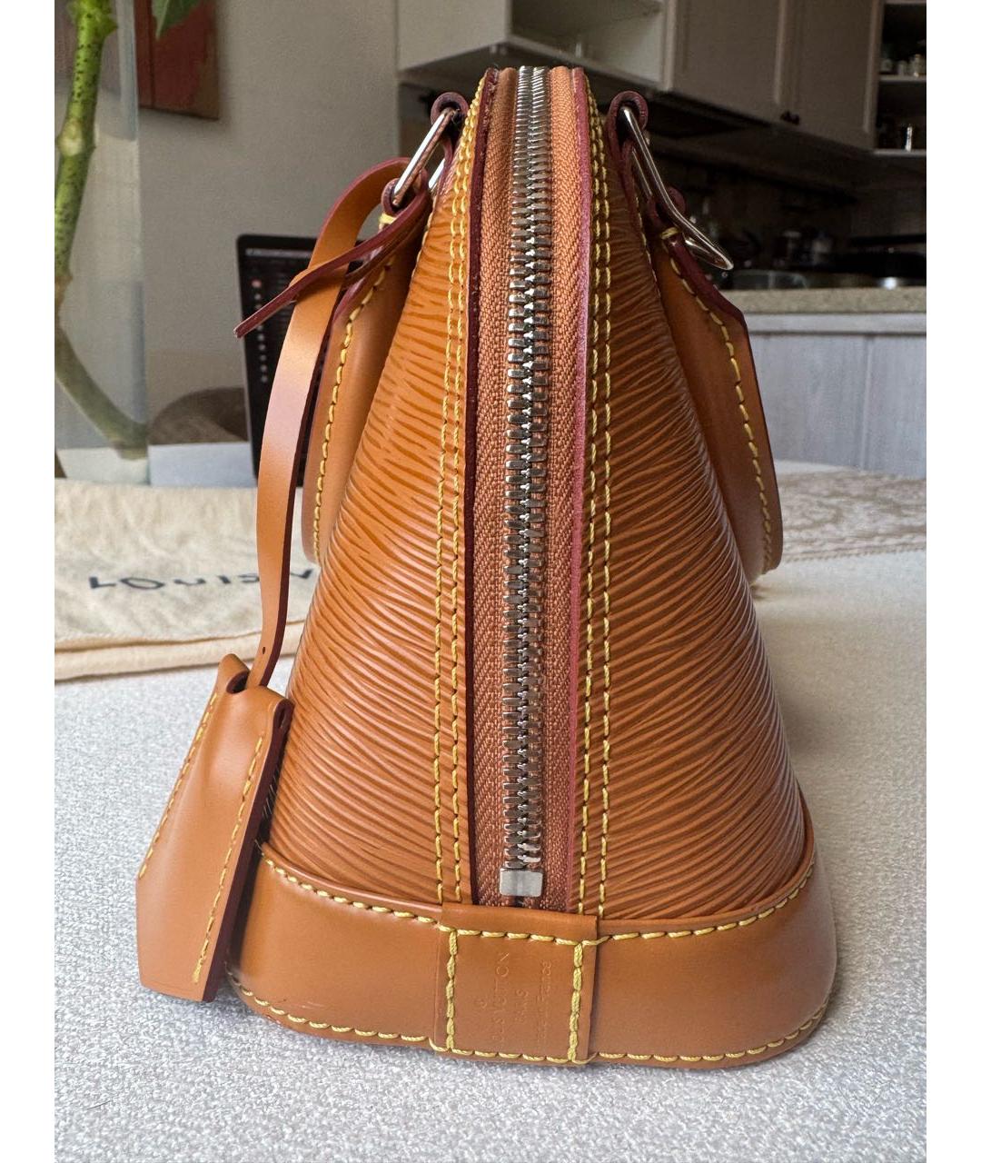 LOUIS VUITTON Коричневая кожаная сумка с короткими ручками, фото 2
