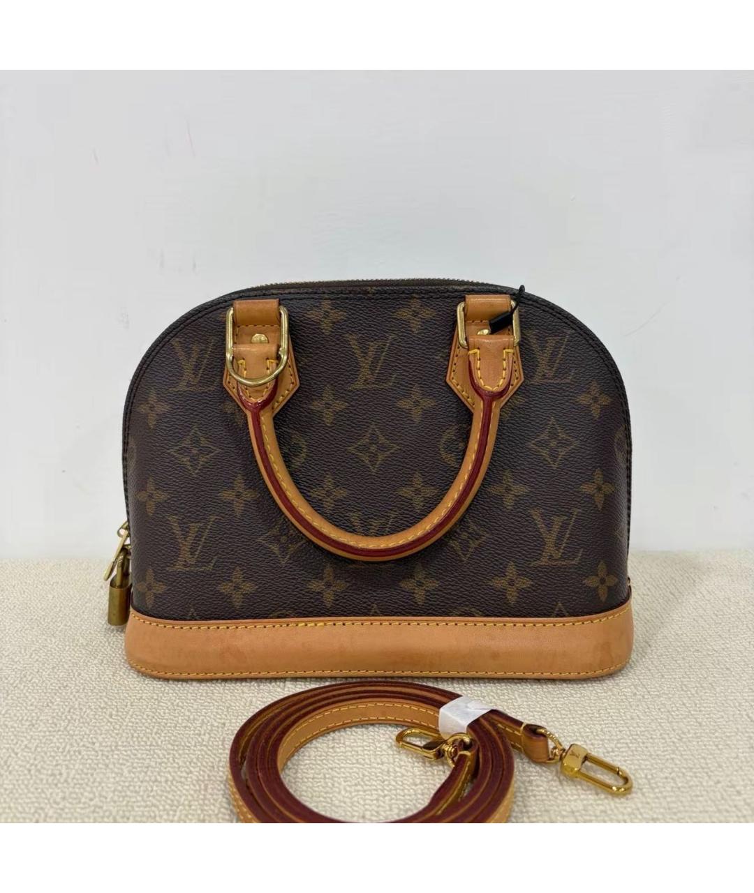 LOUIS VUITTON Коричневая кожаная сумка через плечо, фото 9