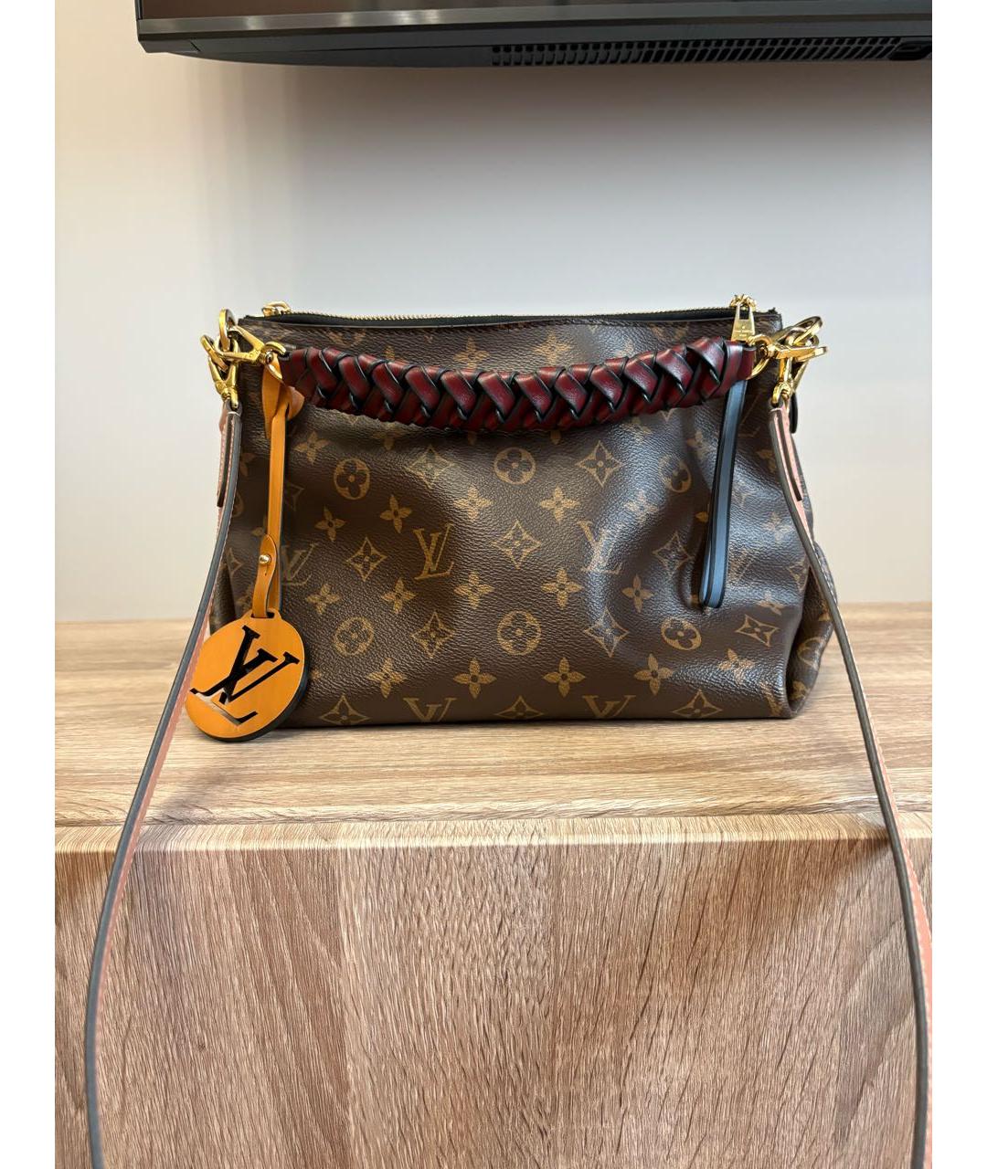 LOUIS VUITTON Коричневая кожаная сумка с короткими ручками, фото 8