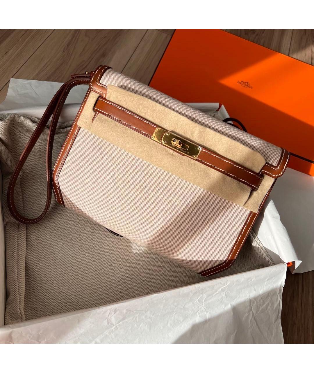 HERMES Коричневая кожаная барсетка, фото 2