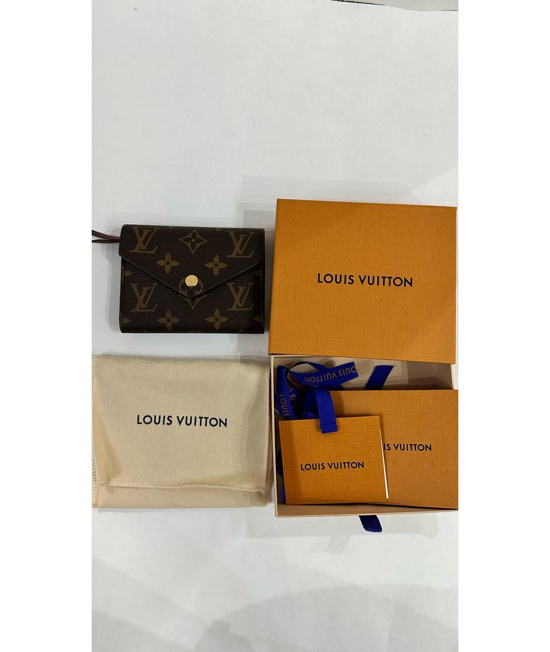 LOUIS VUITTON Коричневый кожаный кошелек, фото 5