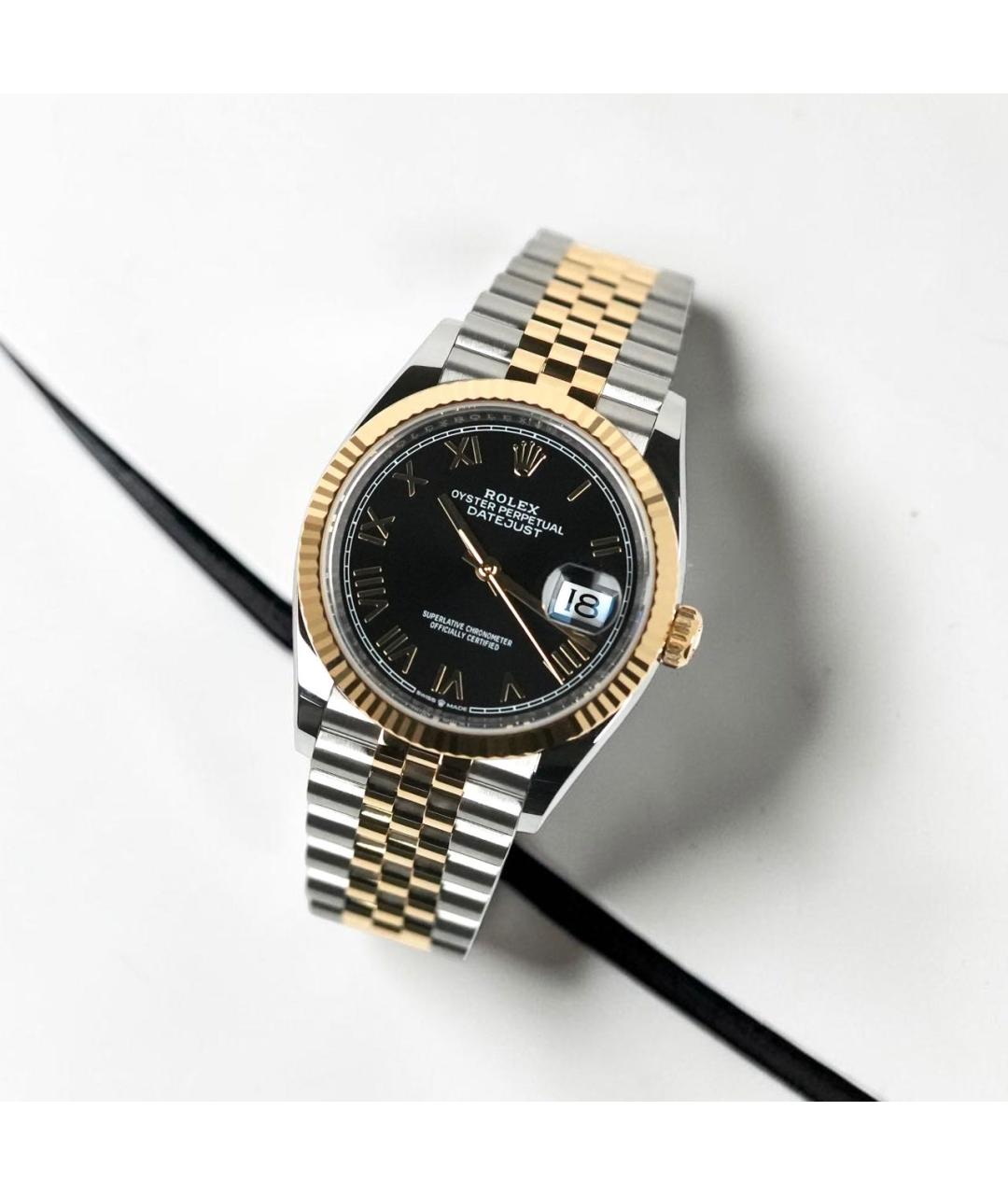 ROLEX Черные часы из желтого золота, фото 2