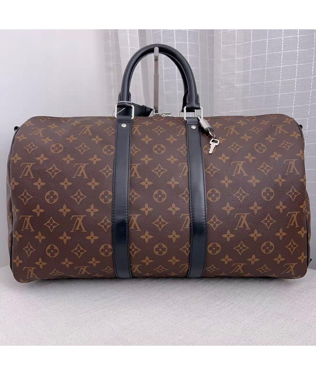 LOUIS VUITTON Черная кожаная дорожная/спортивная сумка, фото 2