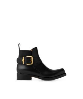 VERSACE Высокие ботинки