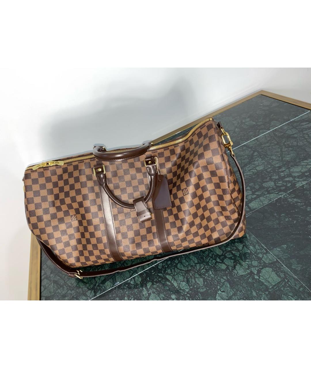 LOUIS VUITTON Коричневая кожаная дорожная/спортивная сумка, фото 6