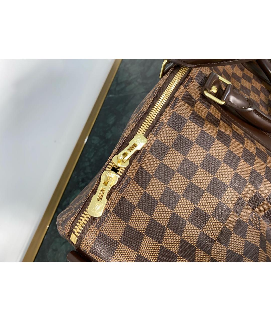 LOUIS VUITTON Коричневая кожаная дорожная/спортивная сумка, фото 8