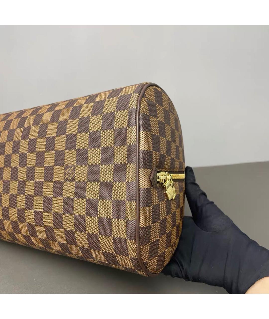 LOUIS VUITTON Коричневая кожаная сумка с короткими ручками, фото 6