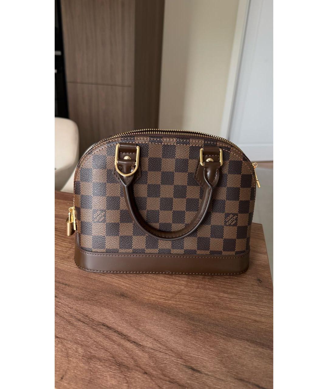 LOUIS VUITTON Коричневая кожаная сумка с короткими ручками, фото 3