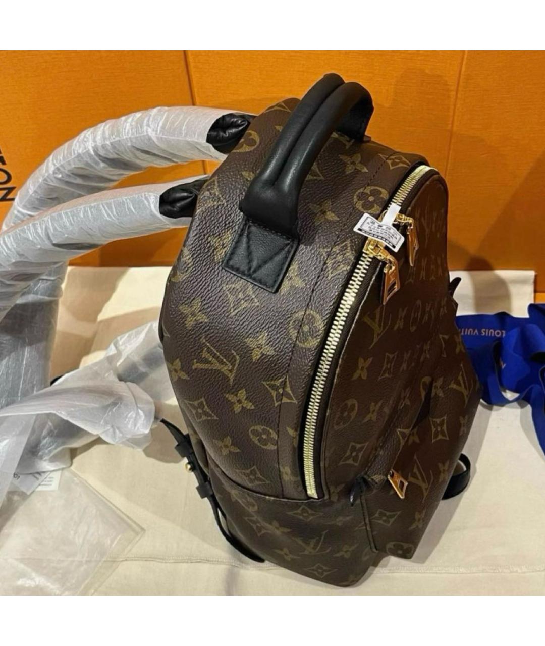 LOUIS VUITTON Коричневый кожаный рюкзак, фото 2