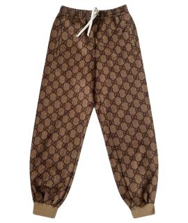 GUCCI Спортивные брюки и шорты