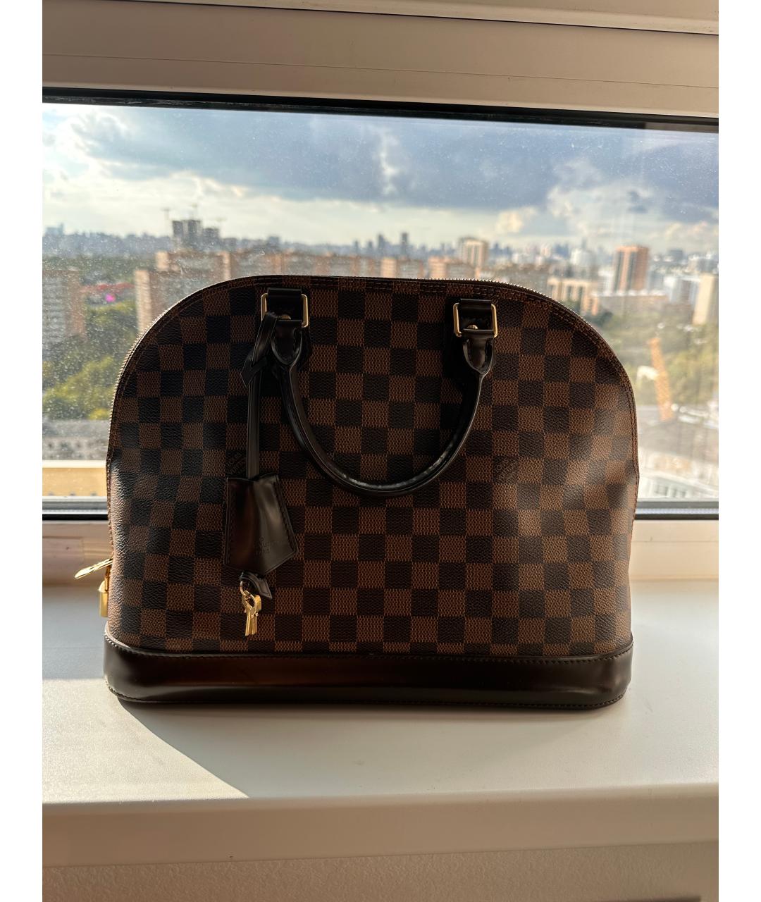 LOUIS VUITTON Коричневая кожаная сумка с короткими ручками, фото 6