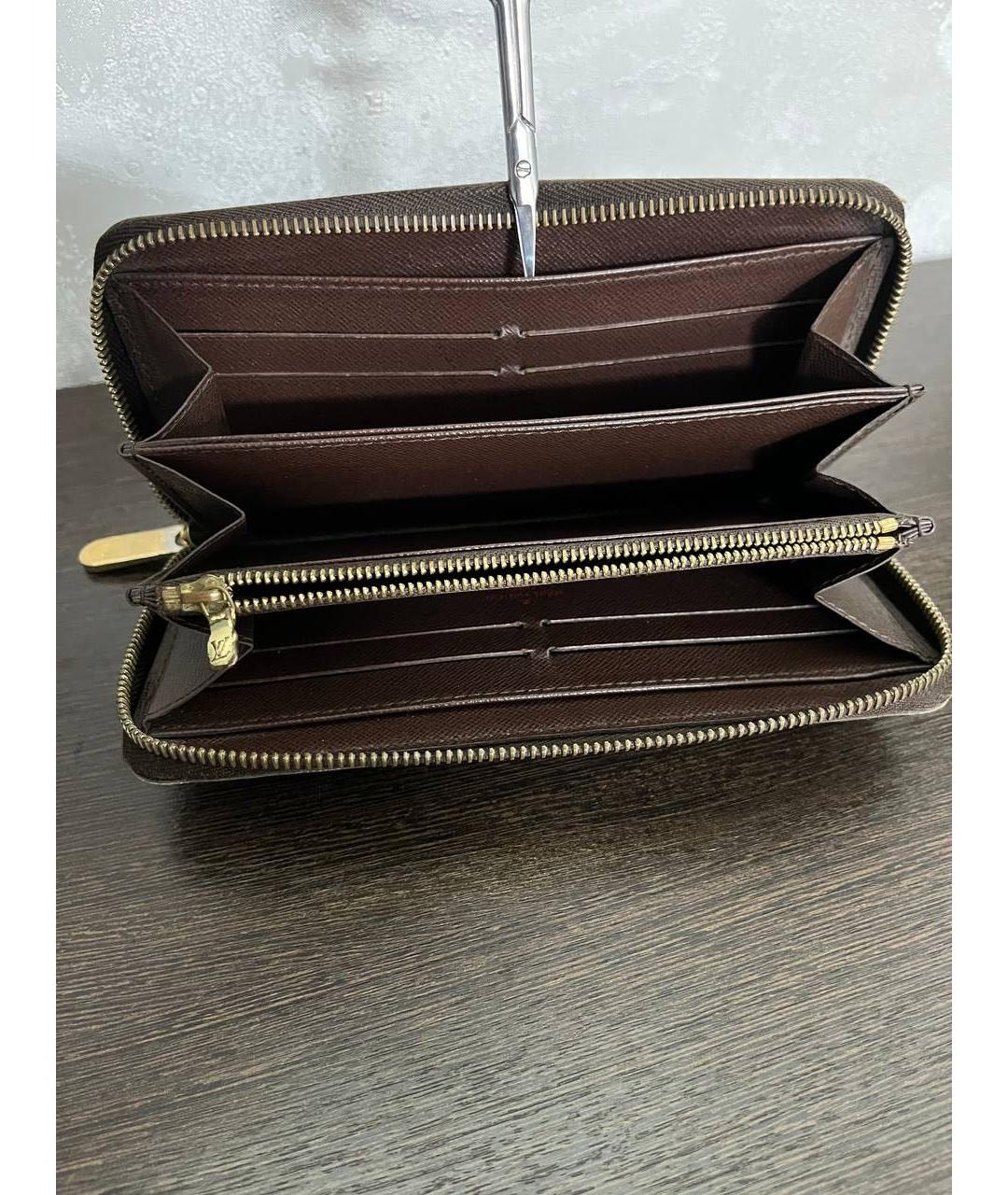 LOUIS VUITTON Коричневый кожаный кошелек, фото 3
