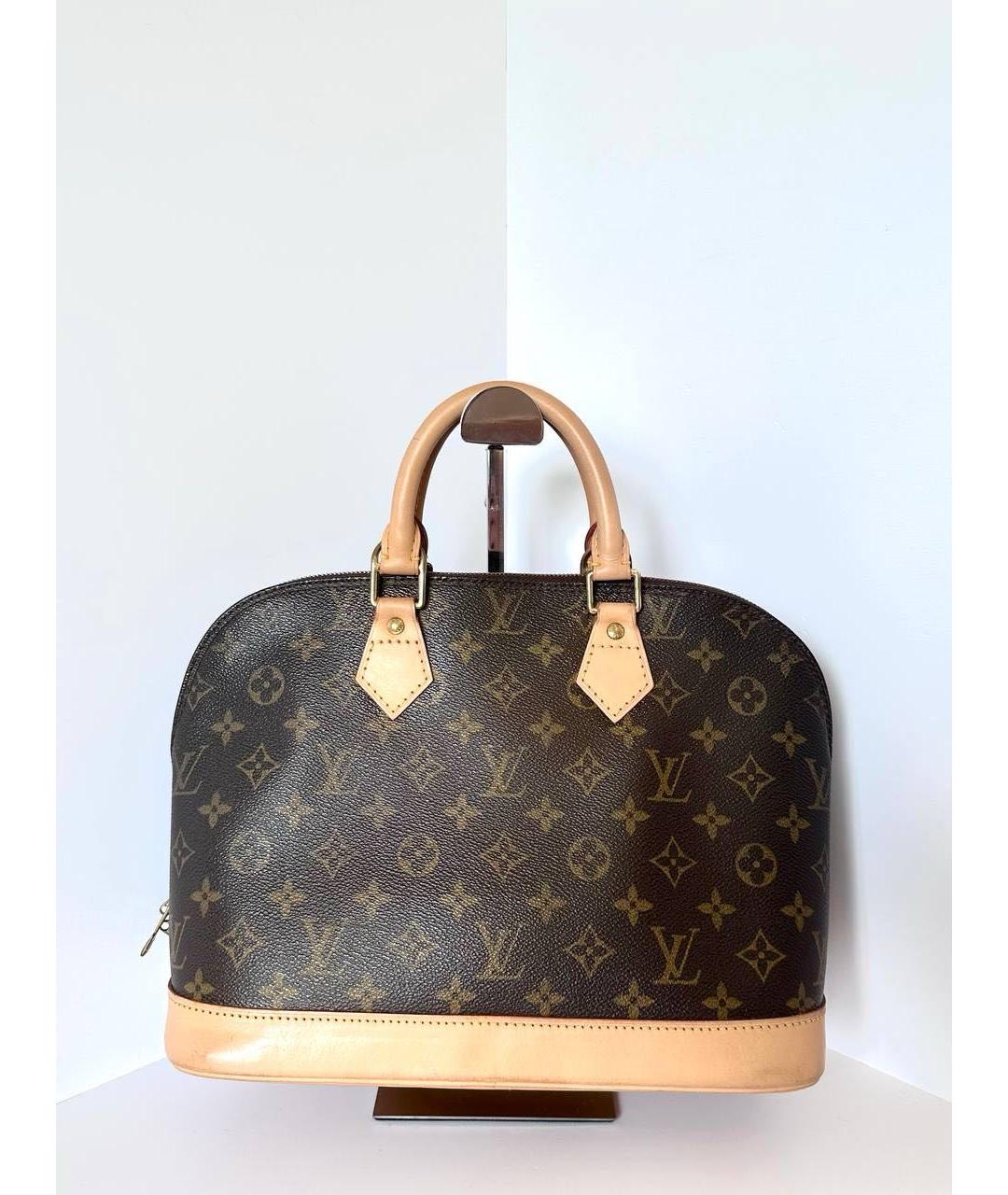 LOUIS VUITTON Коричневая кожаная сумка с короткими ручками, фото 9