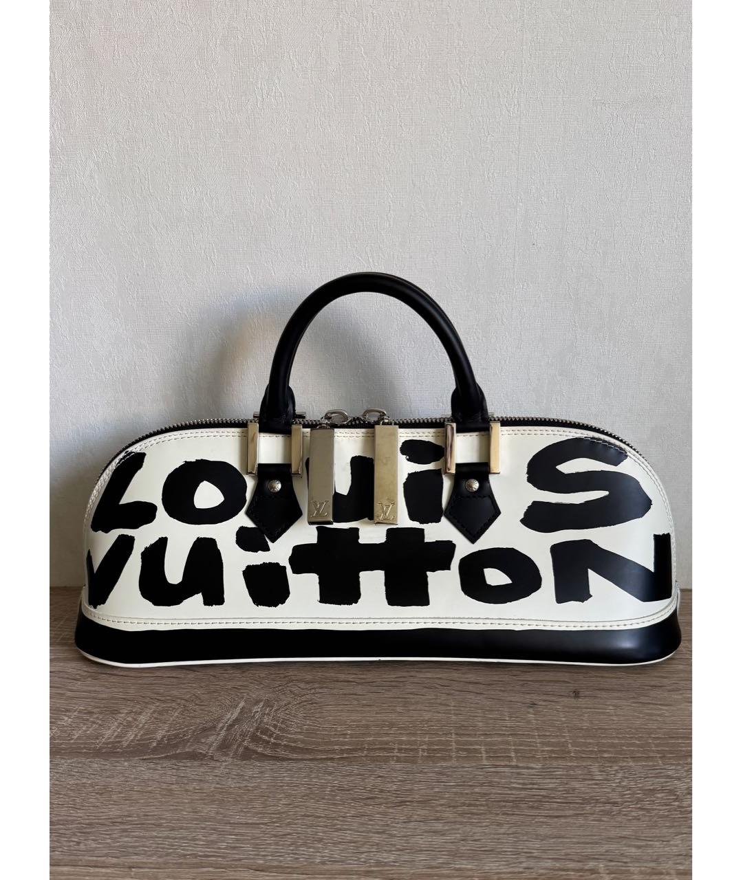 LOUIS VUITTON Кожаная сумка с короткими ручками, фото 9