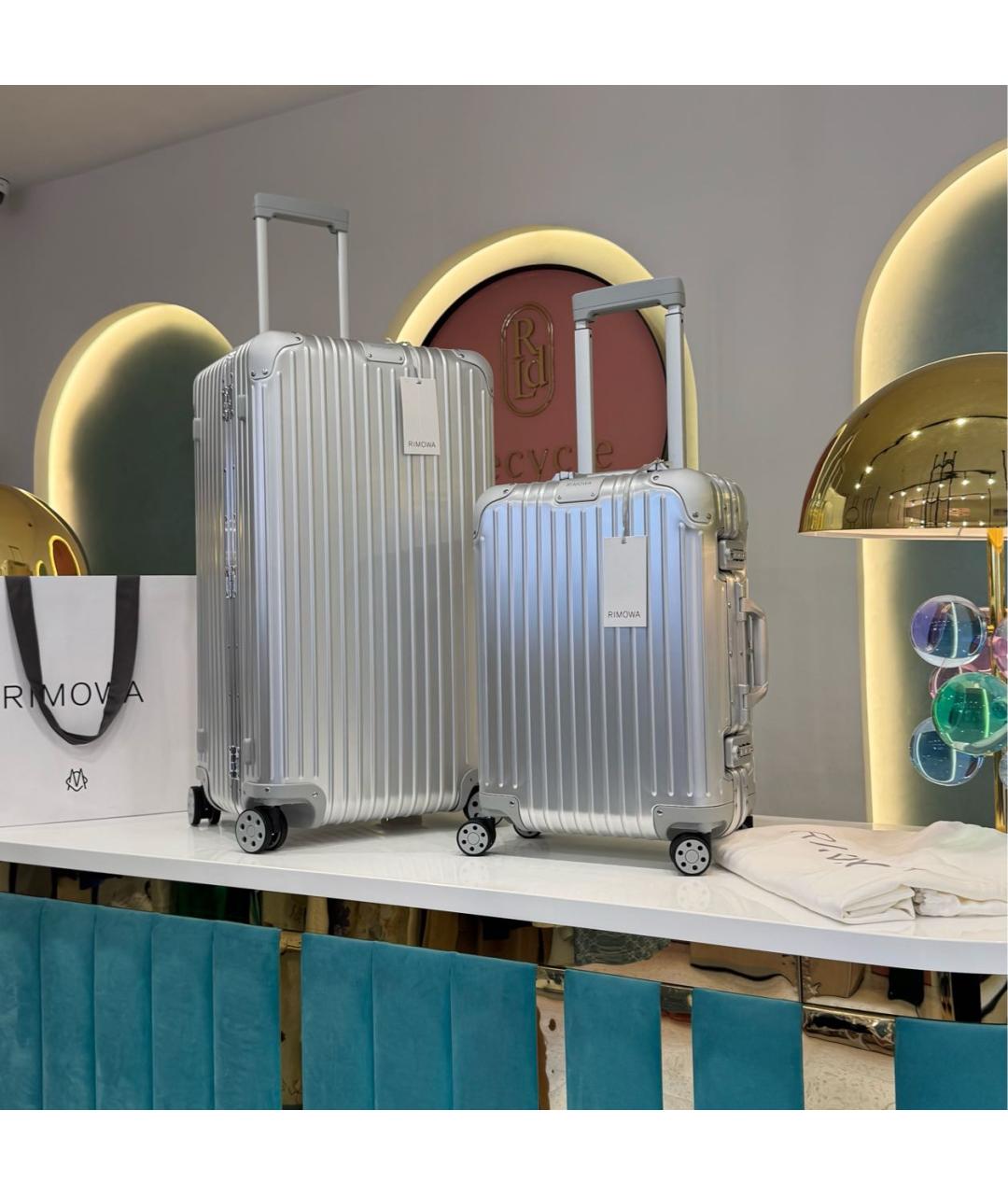 Rimowa Серебряный чемодан, фото 6