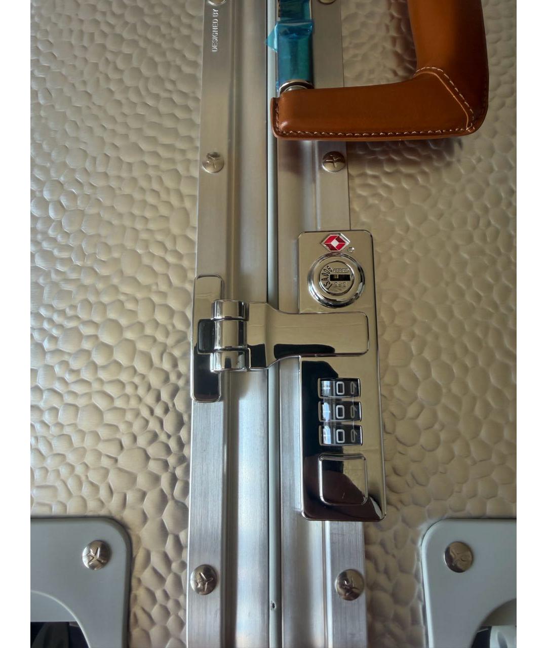 Rimowa Серебряный кожаный чемодан, фото 7
