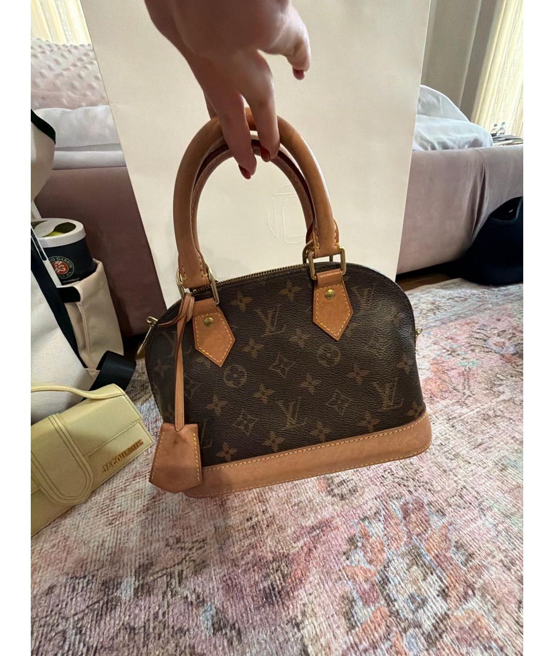 LOUIS VUITTON Коричневая кожаная сумка с короткими ручками, фото 3