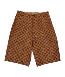 GUCCI Брюки и шорты