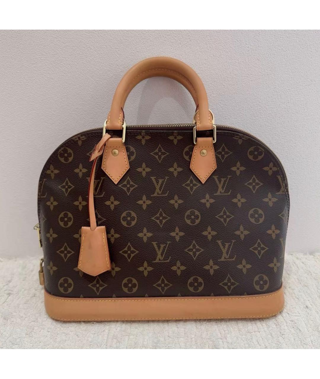 LOUIS VUITTON Коричневая кожаная сумка с короткими ручками, фото 9