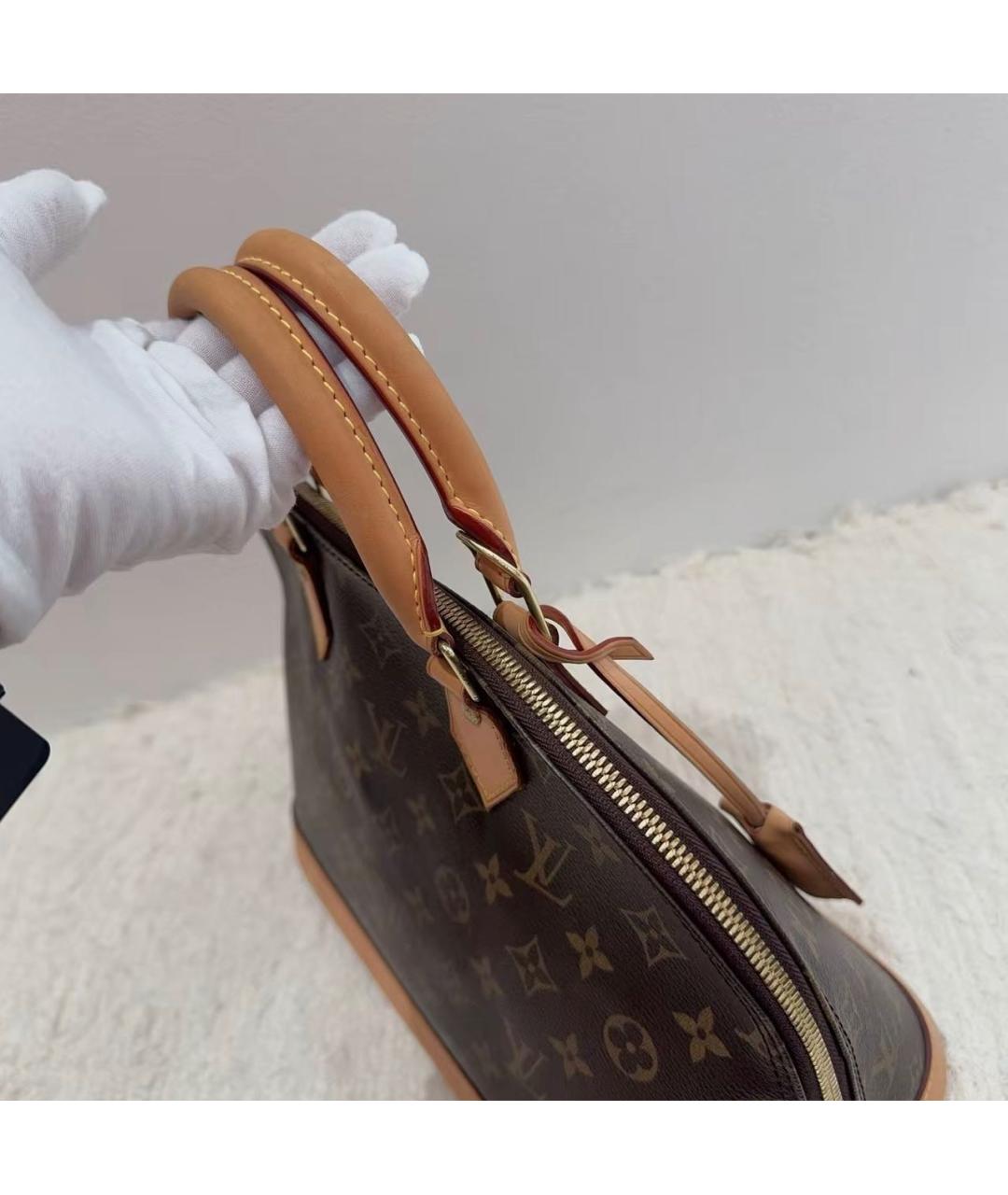LOUIS VUITTON Коричневая кожаная сумка с короткими ручками, фото 5