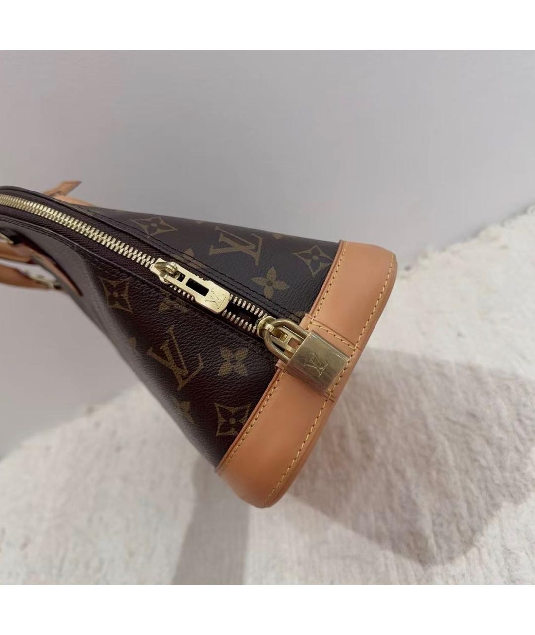 LOUIS VUITTON Коричневая кожаная сумка с короткими ручками, фото 3