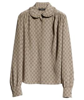 GUCCI Блузы