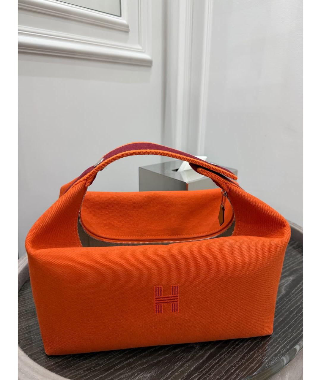 HERMES Оранжевая тканевая косметичка, фото 1