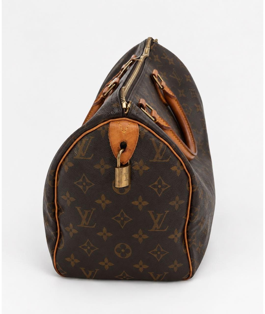 LOUIS VUITTON Кожаная сумка с короткими ручками, фото 2