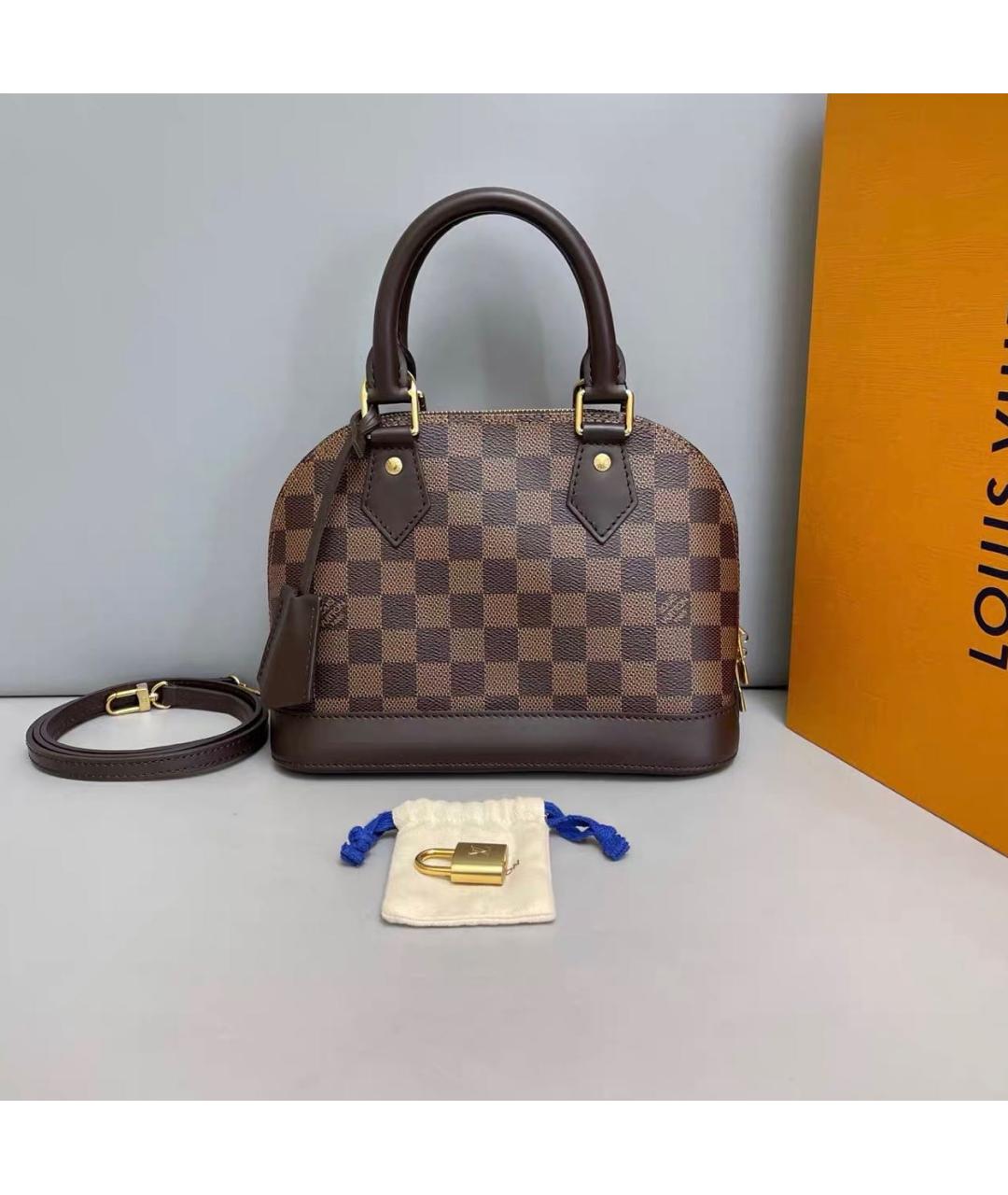 LOUIS VUITTON Коричневая кожаная сумка через плечо, фото 9