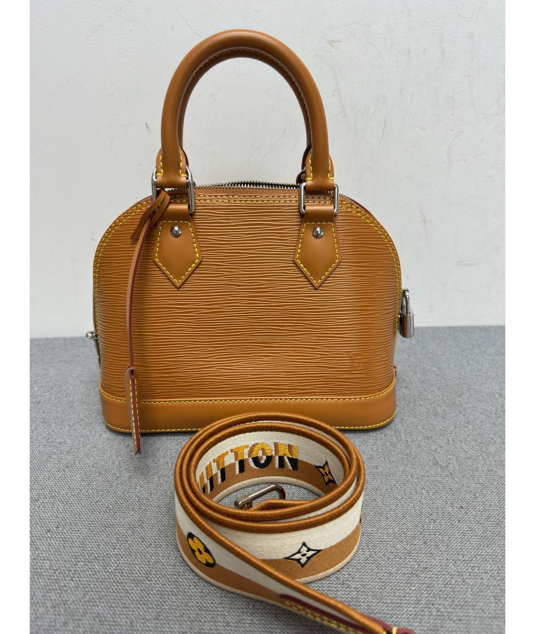 LOUIS VUITTON Коричневая кожаная сумка тоут, фото 7
