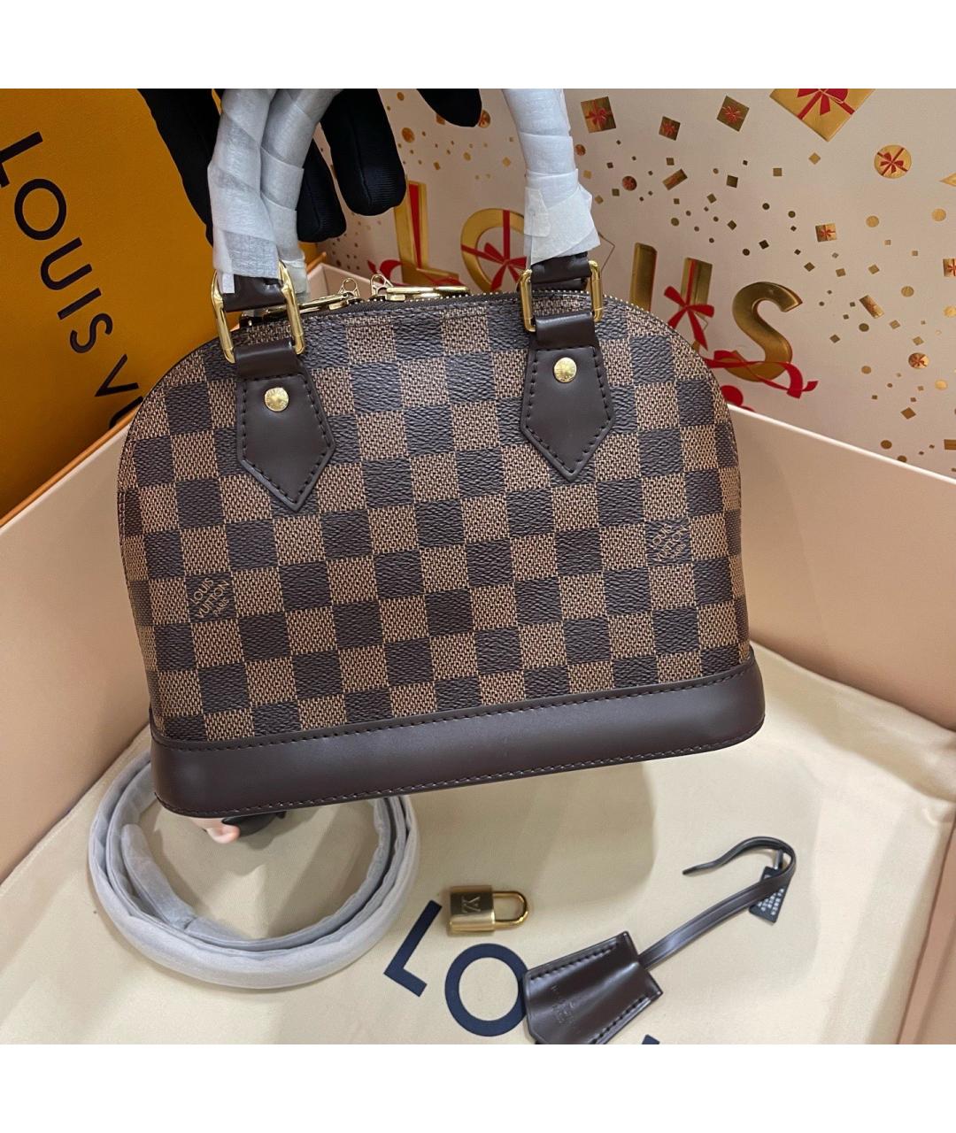 LOUIS VUITTON Коричневая сумка тоут из искусственной кожи, фото 7