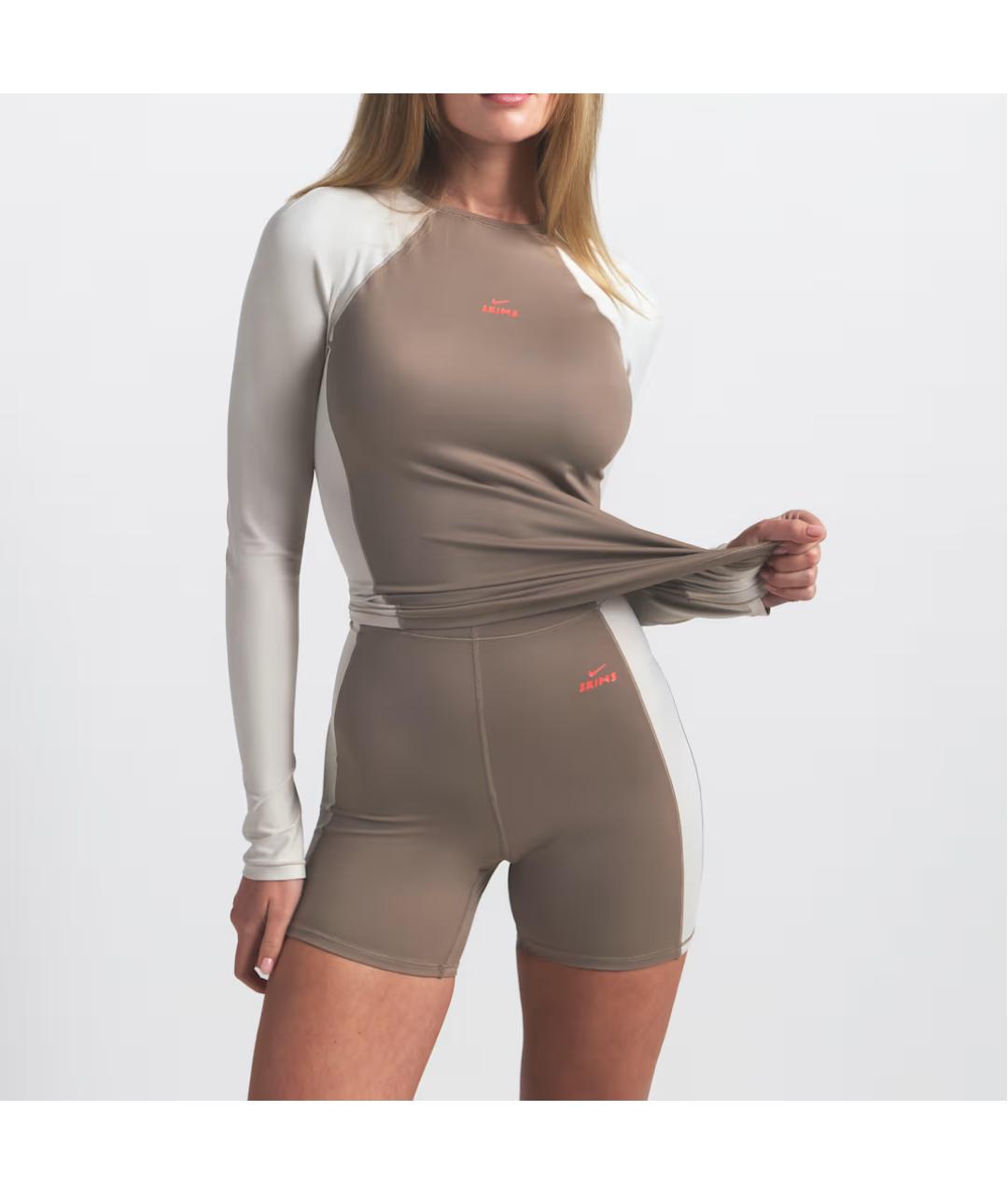 NIKE Коричневые спортивные брюки и шорты, фото 3