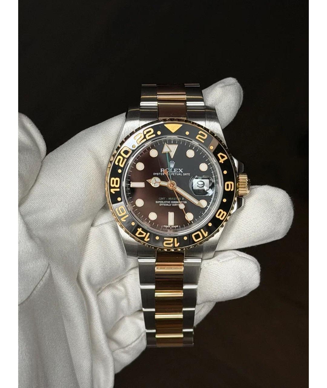 ROLEX Черные часы из желтого золота, фото 2