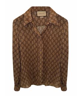 GUCCI Блузы